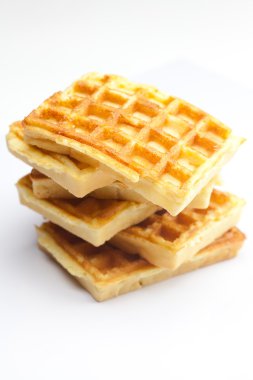 Delicious Belgian waffles is isolated on white