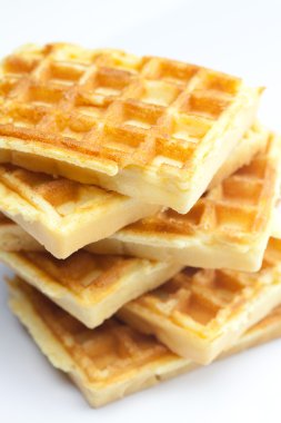 Delicious Belgian waffles is isolated on white