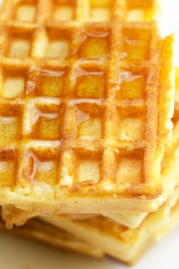 Delicious Belgian waffles is isolated on white