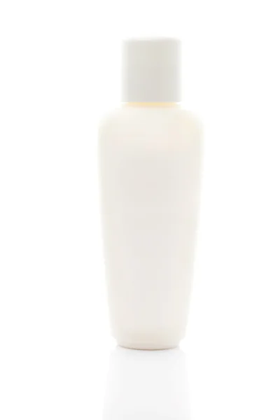 Recipientes cosméticos isolados em branco — Fotografia de Stock