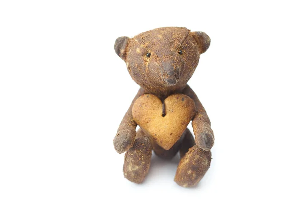 Teddy bear handmade and cookie in the form of heart isolated o — Stock Photo, Image