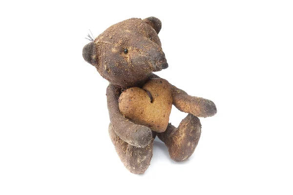 Medvídek ručně a cookie v podobě izolovaných o srdce — Stock fotografie