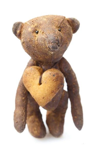 Teddy bear handmade and cookie in the form of heart isolated o — Stock Photo, Image