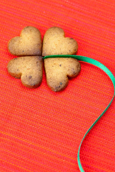 stock image Cookie in the form of an Irish clover and green and green on a