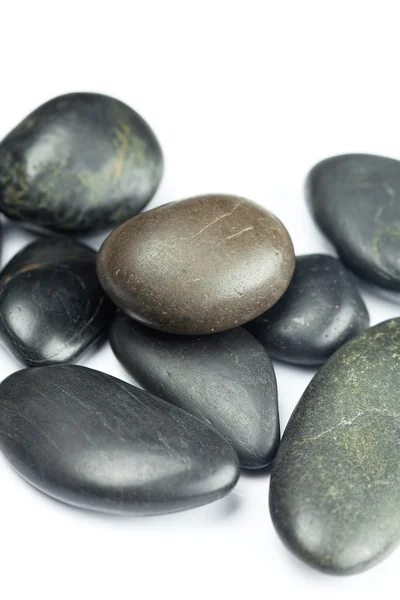 Grandes pedras spa preto isolado em branco — Fotografia de Stock