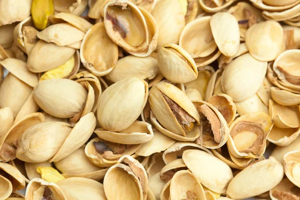 Bakgrund från skalet av pistagenötter — Stockfoto