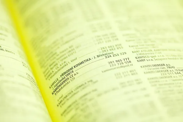 Bakgrund av en katalogen gula sidorna — Stockfoto