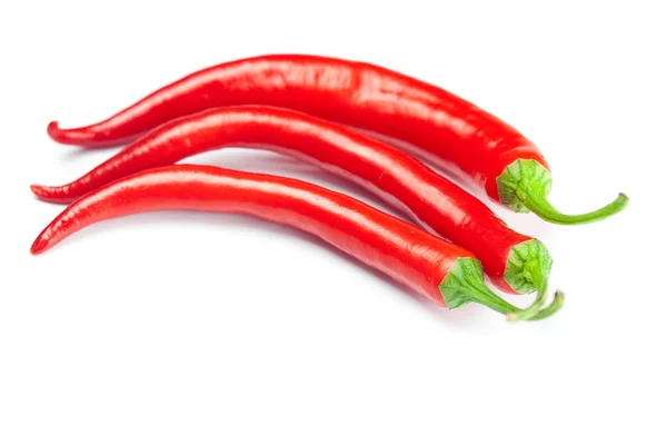 Juicy red chili peppers isolated on white — Stock Photo, Image