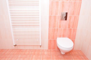 Interior bathroom with pink tile in the house clipart