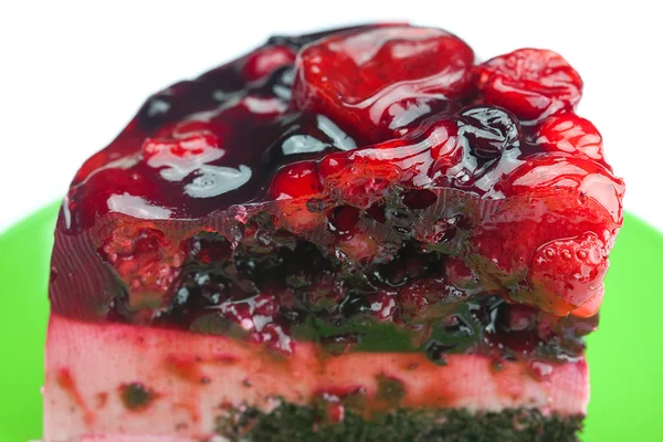 Krásný dort s ovocem na izolované na bílém talíři — Stock fotografie