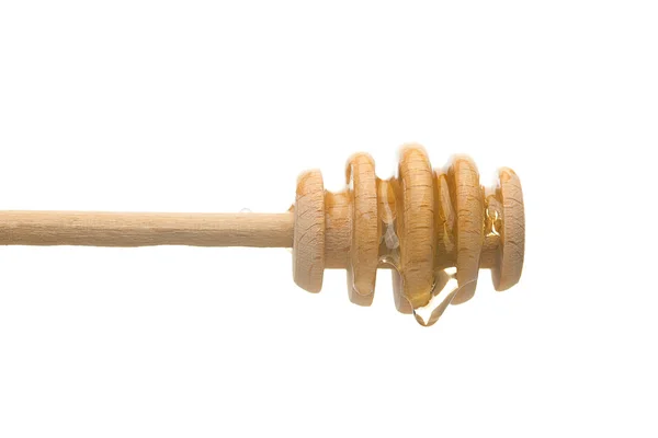 Stick to honey is isolated on white — Stock Photo, Image