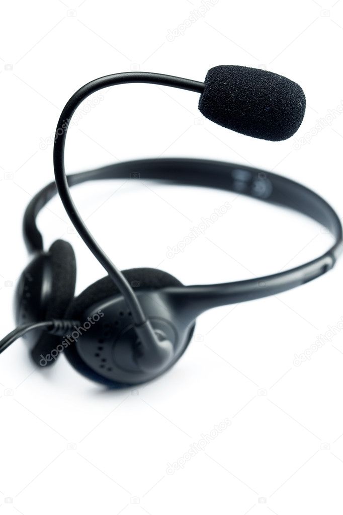 A black headset is isolated on white