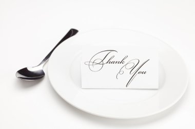 Plate with card signed thank you isolated on white clipart