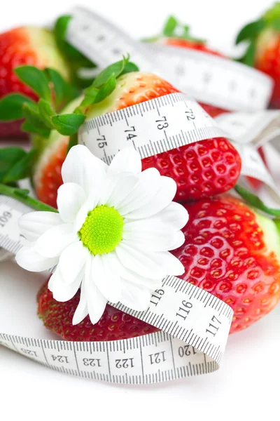 Background of red big juicy ripe strawberry and flower — Stock Photo, Image