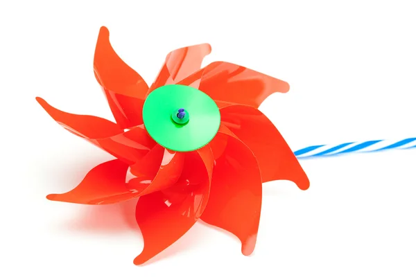 Brinquedo moinho de vento vermelho isolado no branco — Fotografia de Stock