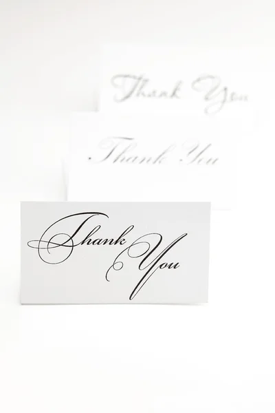 Открытка подписанная благодарностью на белом — стоковое фото