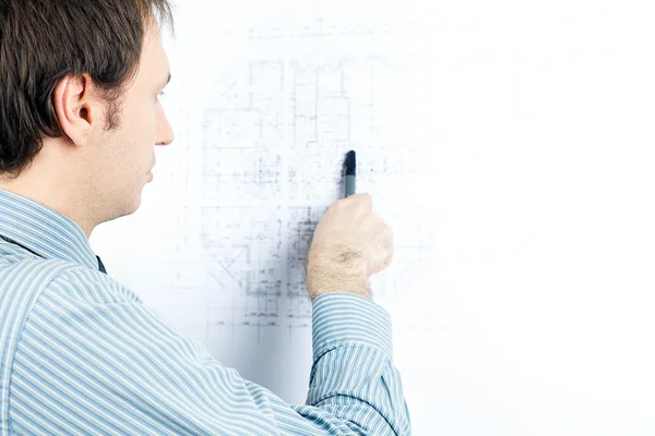 Young man architect presenting a project — Stock Photo, Image