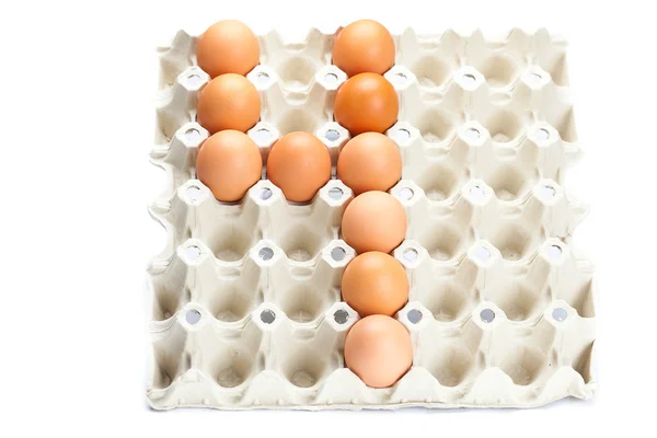 白で隔離される 4 番として卵 — ストック写真
