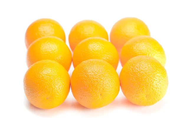 Duże pomarańcze na białym tle — Zdjęcie stockowe