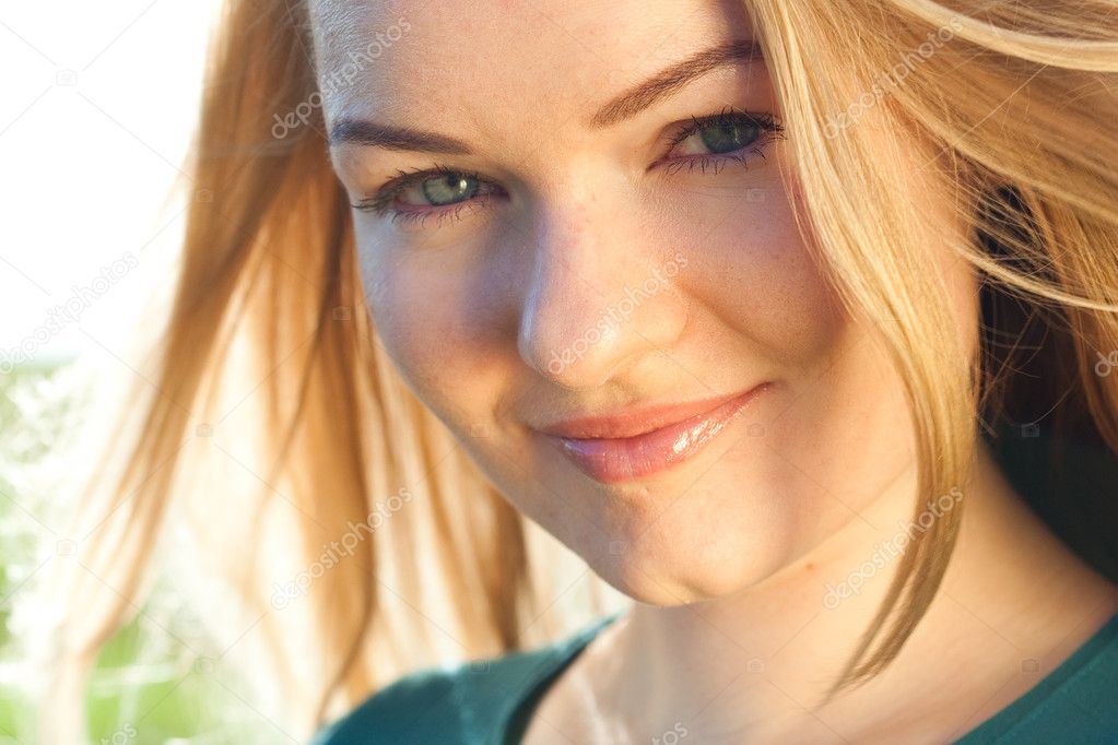 Portrait of a beautiful young woman outdoor