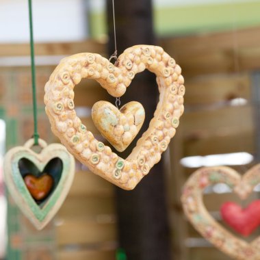 Ceramic heart at the fair clipart