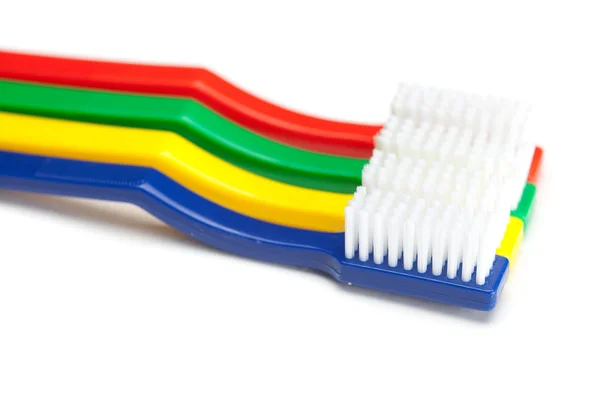 Кольорова зубна щітка ізольована на білому — стокове фото