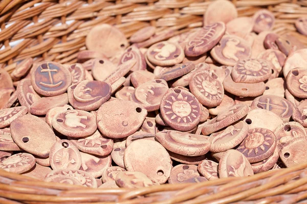 Background of clay ornaments in a basket — Stock Photo, Image