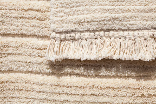 Hintergrund des Teppichs aus Schafwolle auf der Messe — Stockfoto