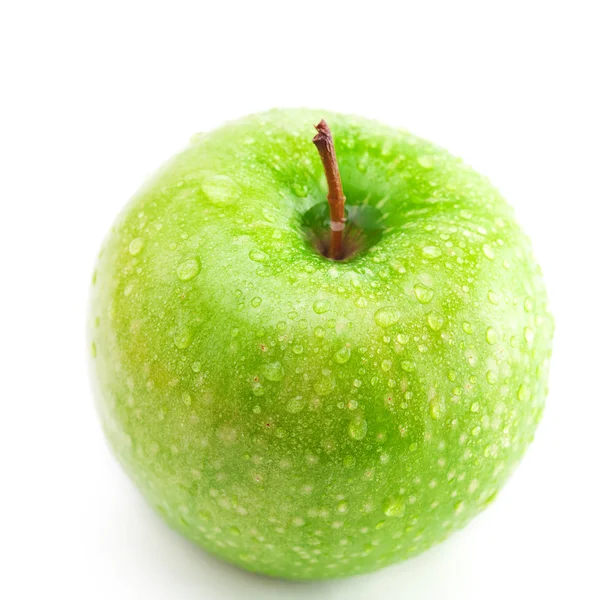 Büyük yeşil elma ile üzerine beyaz izole su damlaları — Stok fotoğraf