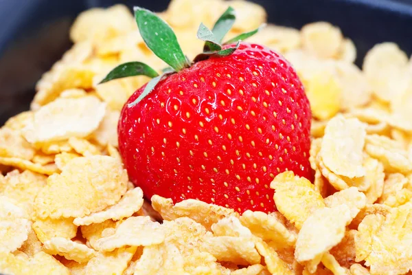 Strawberry and flakes in a bowl — Stock Photo, Image