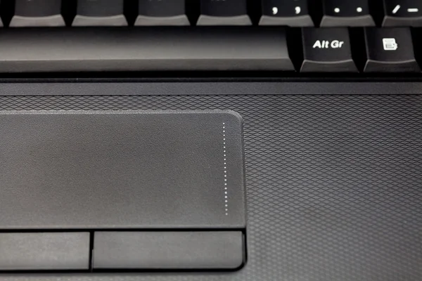 Touchpad és a billentyűzet laptop közeli képe — Stock Fotó