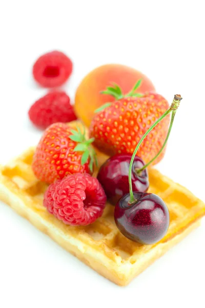 Waffles, cherry, strawberry, apricot and raspberry isolated on w — Stock Photo, Image