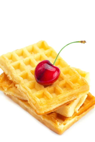 Waffles e cerejas isoladas a branco — Fotografia de Stock