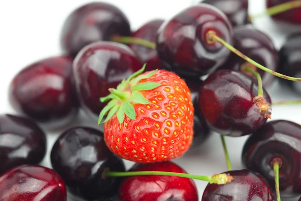 Strawberry on background cherry — Stock Photo, Image