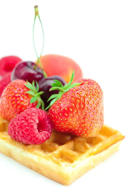 Waffles,apricot, cherries, strawberries and raspberries isolated — Stock Photo, Image