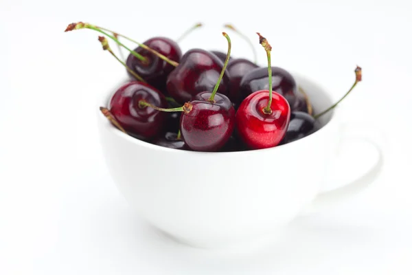 Cherries in a bowl isolated on white — Stock Photo, Image