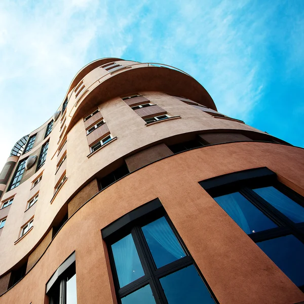 stock image Modern office building against the blue sky