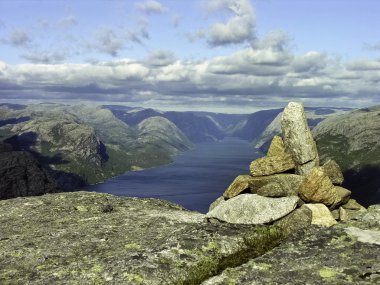 Atop of a Norway mountain clipart