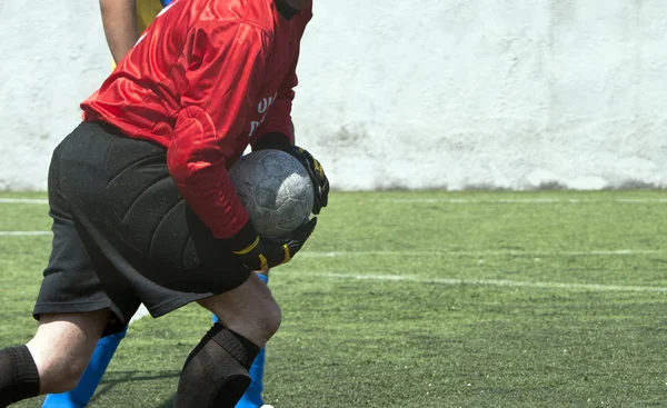 Red dressed football goalkeeper — Stock Photo, Image