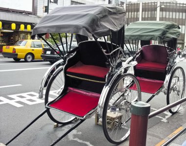 Rickshaw in urban style clipart