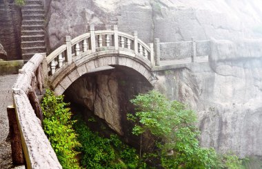 Stone bridge in Huangshan mountains clipart