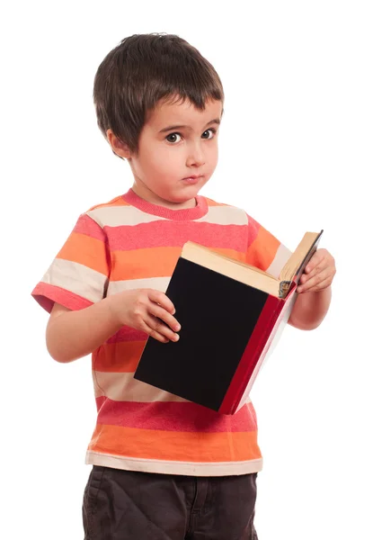 Niño se detiene de preguntarse libro de lectura — Foto de Stock