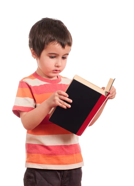 Kisfiú könyvet olvas. — Stock Fotó