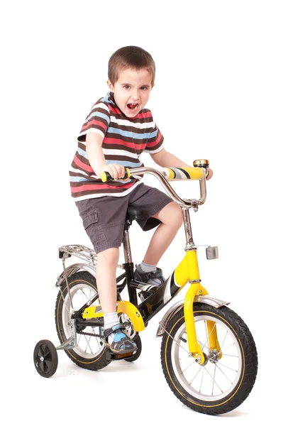 Skrikande liten pojke på cykel — Stockfoto