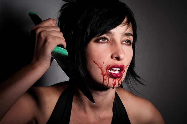 stock image Crazy vampire woman with blood on her face