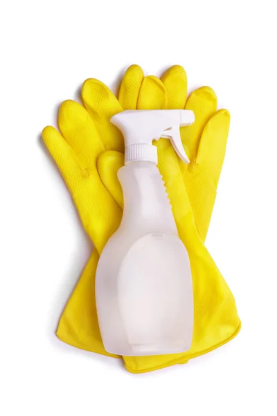 Gelbe Handschuhe und Spray — Stockfoto