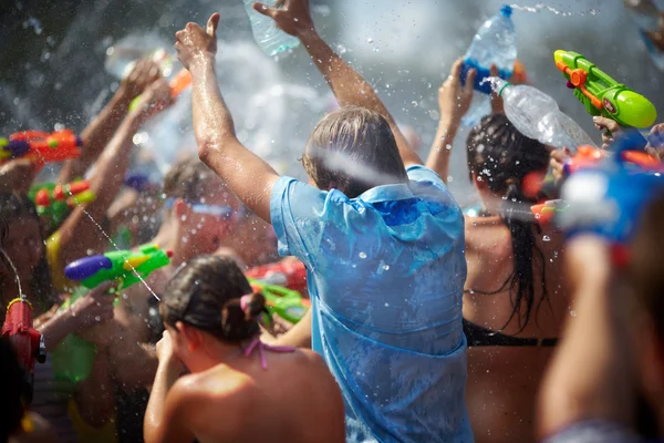 Shooting and throwing water at each other — Stock Photo, Image