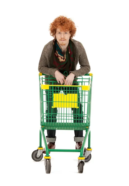 Muž s nákupním vozíkem — Stock fotografie