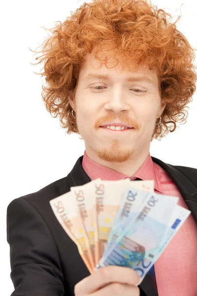 Stock image Handsome man with euro cash money