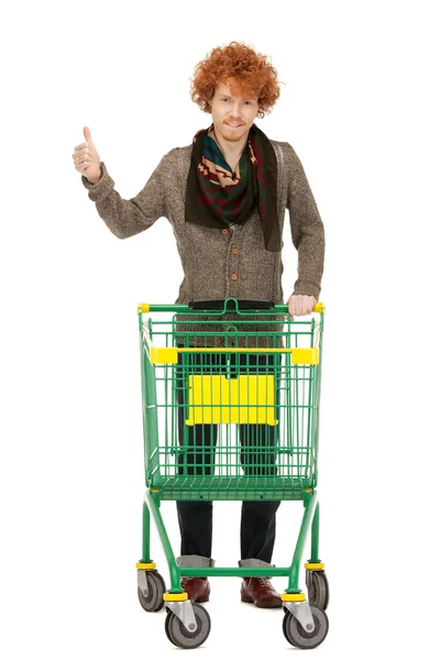 Homem com carrinho de compras — Fotografia de Stock